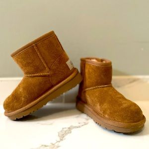 Worn once toddler size 8 uggs with cute button detail